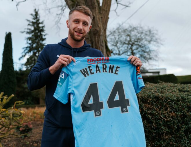 Stephen Wearne signs